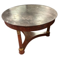 Empire mahogany and gray marble top center table