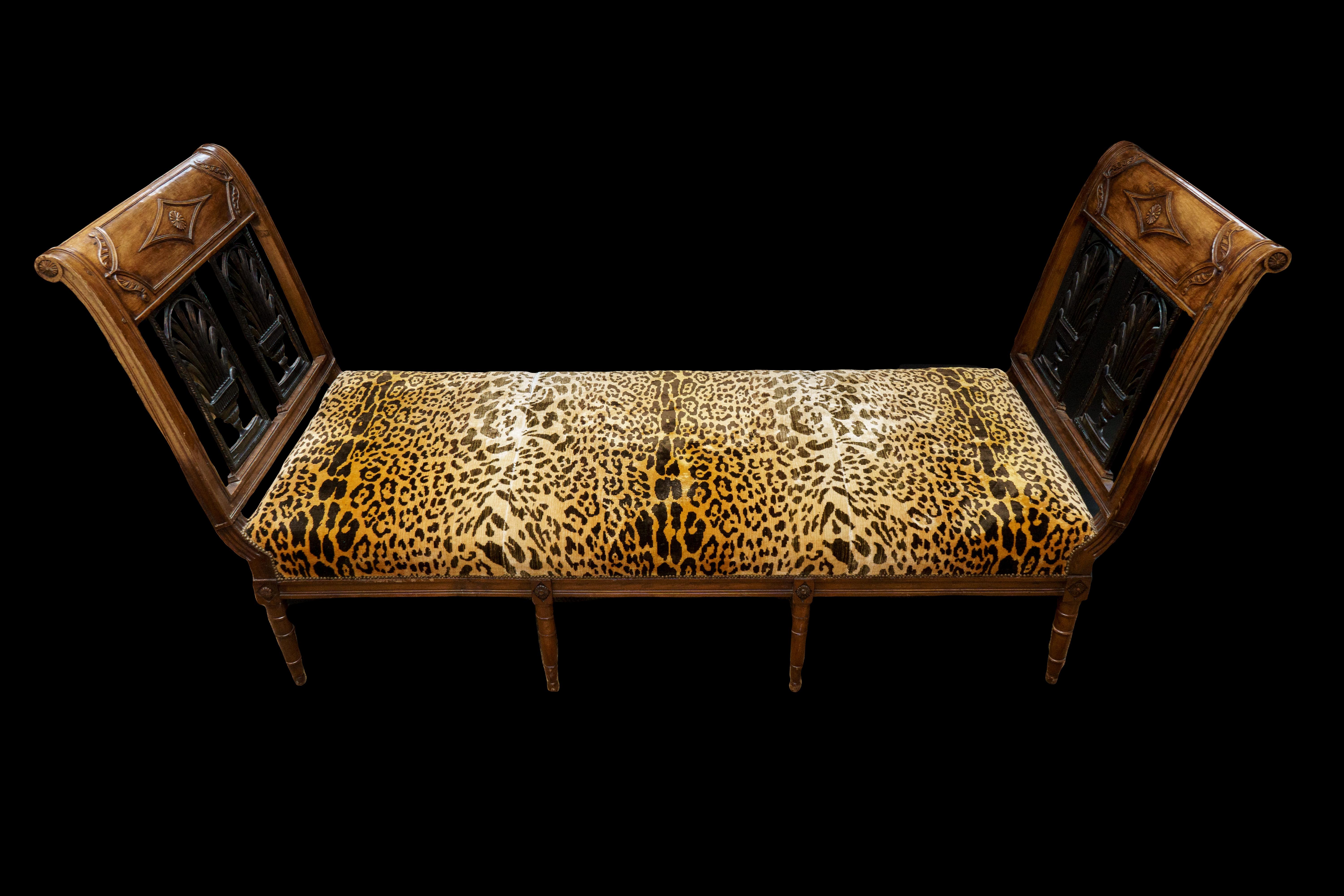 A Directoire Mahogany Stained Fruitwood Banquette/Daybed with Le Manach Leopard fabric from Pierre Frey -circa 1800

Measures: 82