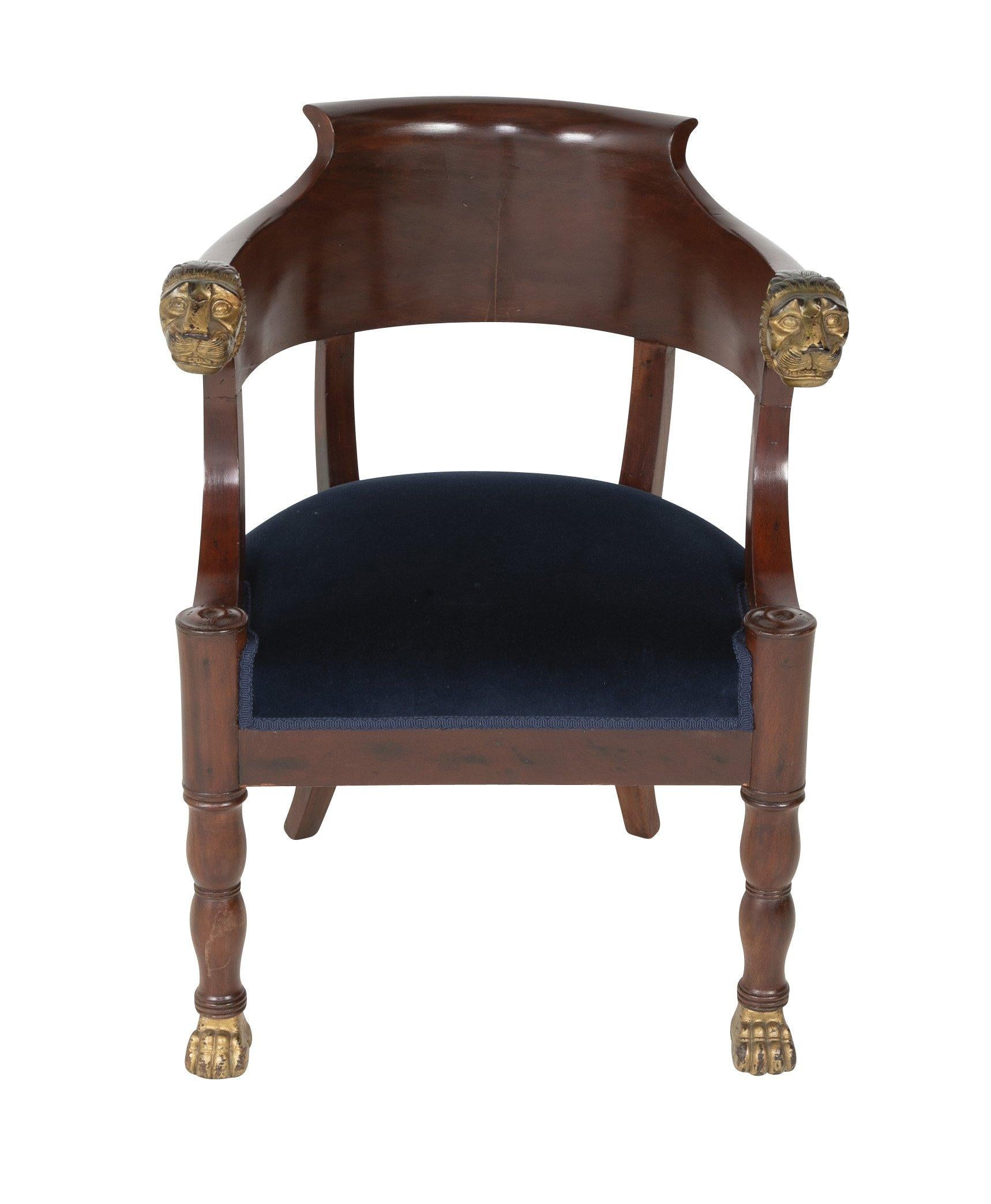 Empire mahogany paw foot Fauteuil de Bureau with giltwood lion's head arms, circa 1815.


We are proud of our long-standing partnership with George N Antiques who specializes in fine authentic antique furniture and decorative objects of the 18th and