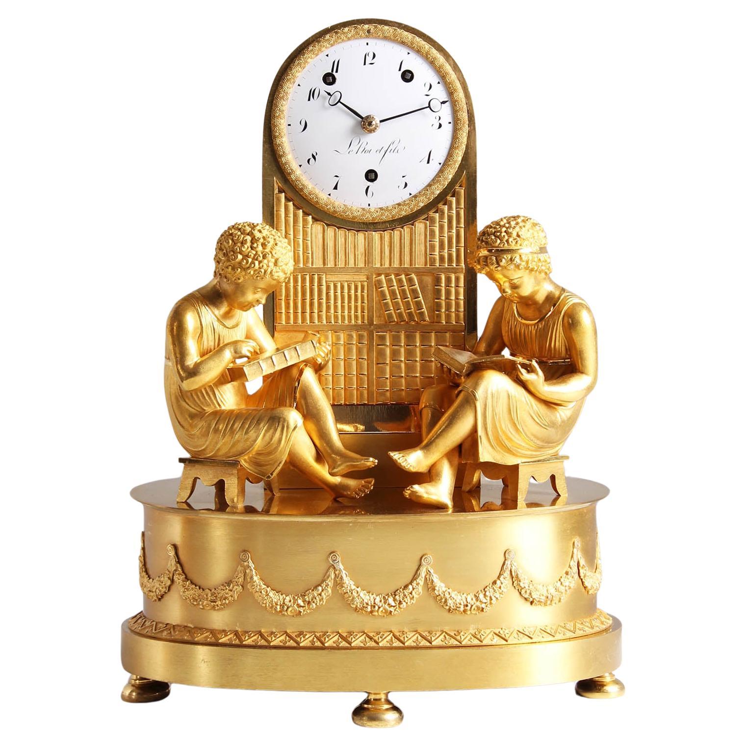 Empire Mantel Clock - La Bibliotheque, Ormolu, France, Paris, circa 1820 For Sale
