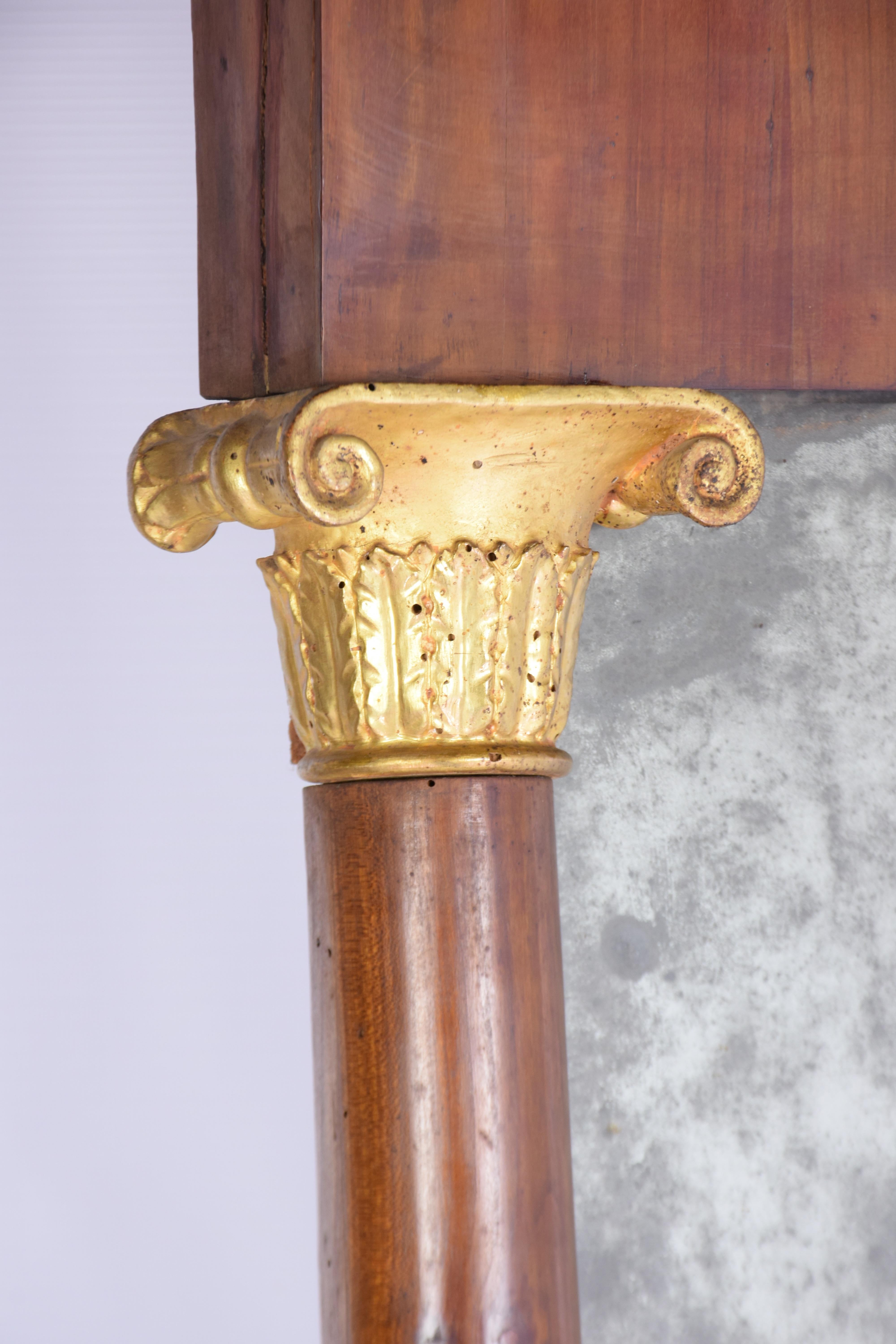Lucca Tuscany, early 19th century
Cherry veneer
Antique mirror
Capitals, bases, feet and central carving gilded with pure gold.
Dimensions: W 77 x H 150 cm.