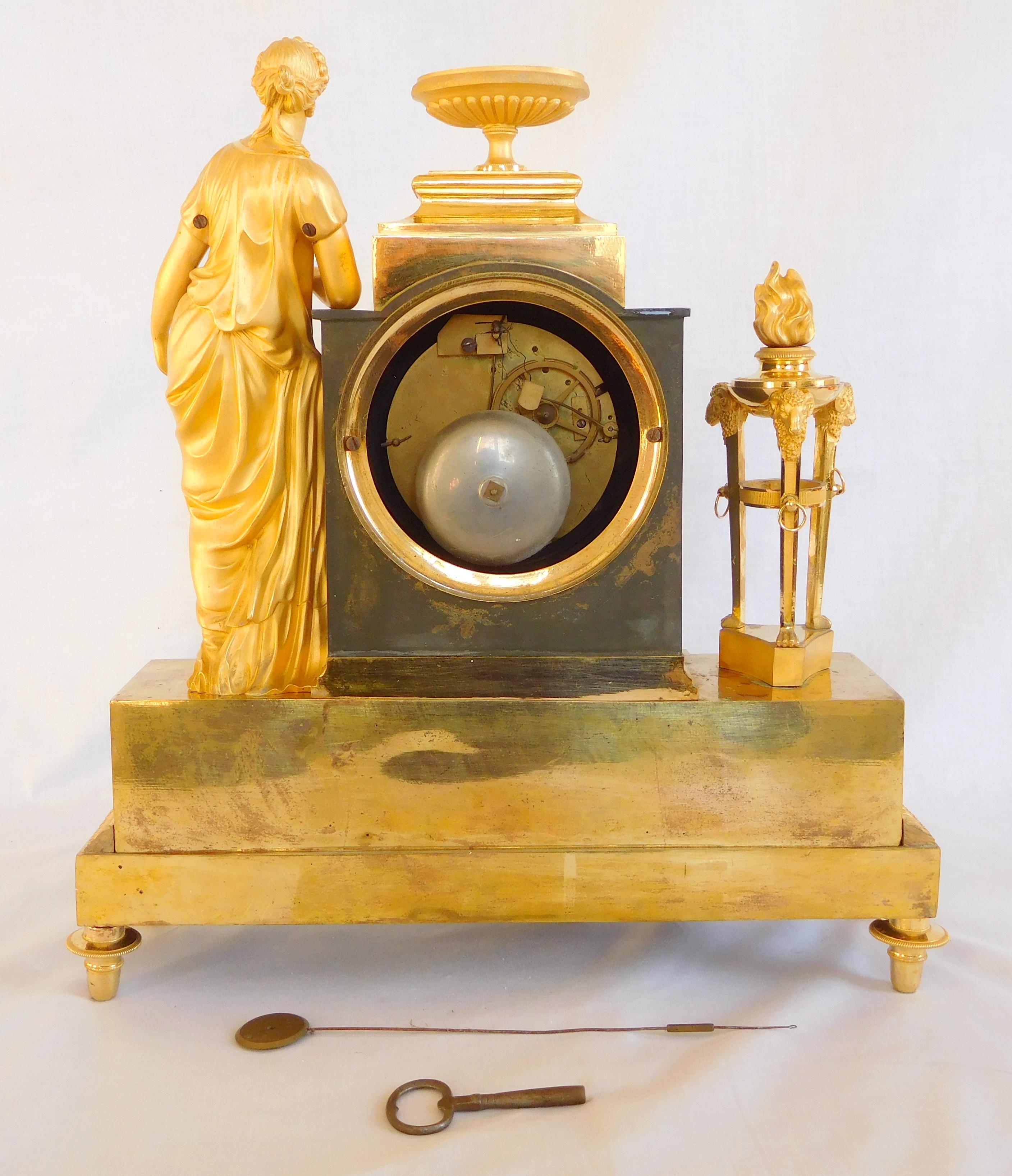 Reloj imperio de ormolina firmado Ravrio, siglo XIX hacia 1805 Francés en venta