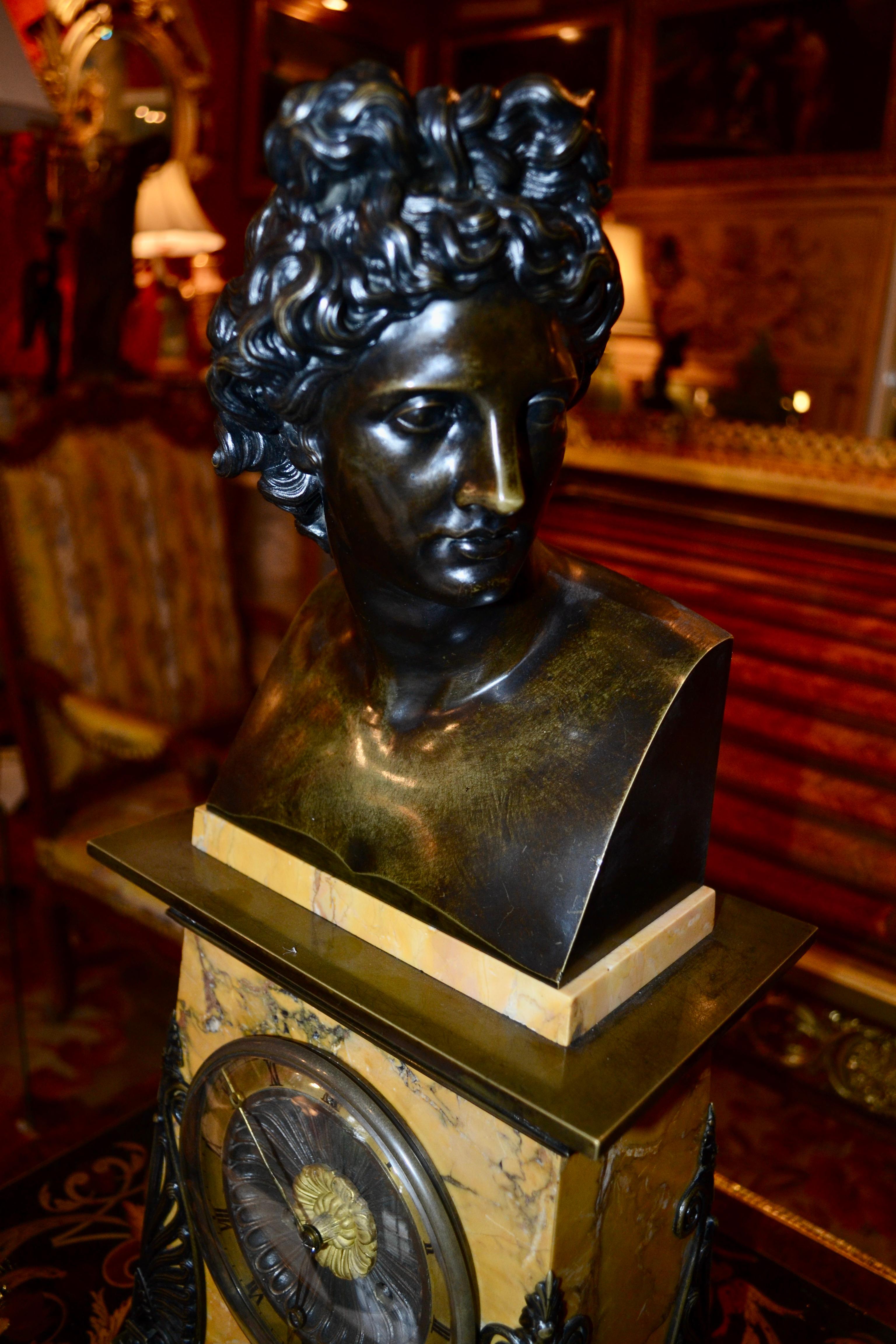   Empire Bronze and Sienna Marble Clock with a bust of Apollo Belvedere For Sale 1
