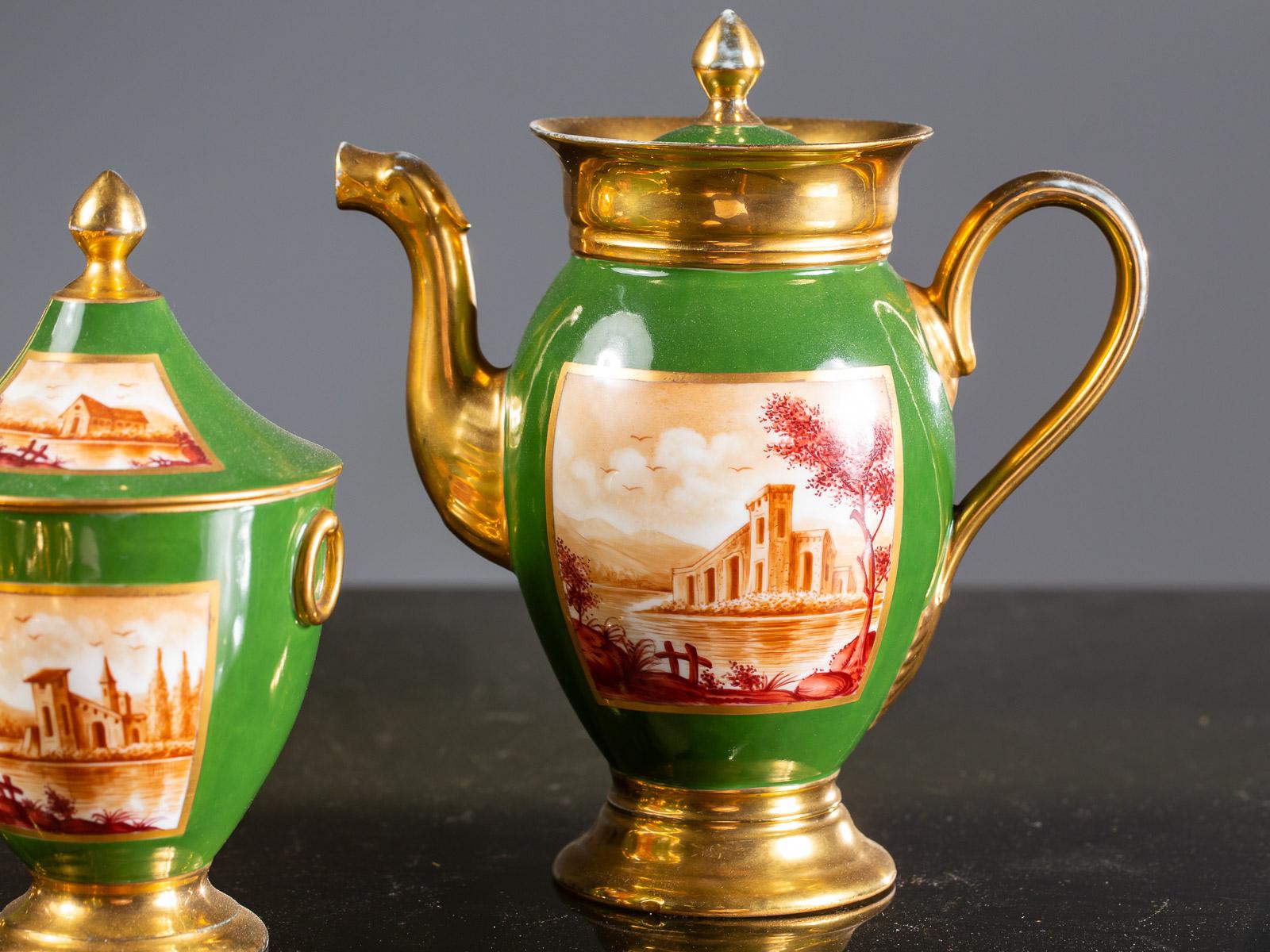 A luscious Empire period antique French hand painted porcelain tea coffee set, circa 1810. Please be sure to enlarge all the photographs (30 total) to see the exceptional hand painted scenes on all of these individual pieces. Including a covered