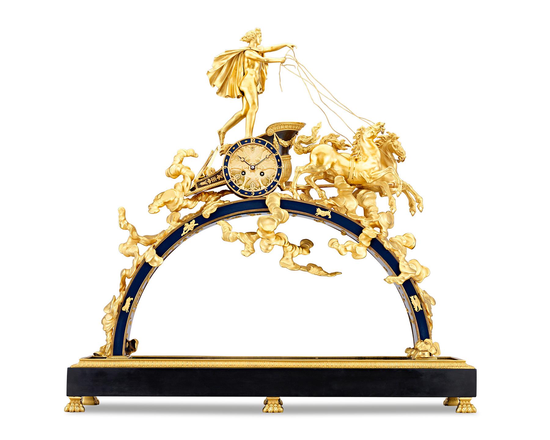 The Greek god Apollo drives his Chariot of the Sun across the sky atop this exceptional Empire clock. The clock face is cleverly contained within the wheel of Apollo's chariot, while the dial indicates the hour on Arabic numerals with Breguet hands.