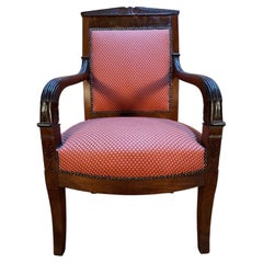 Fauteuil de style Empire en acajou, avec pieds en forme de sabre