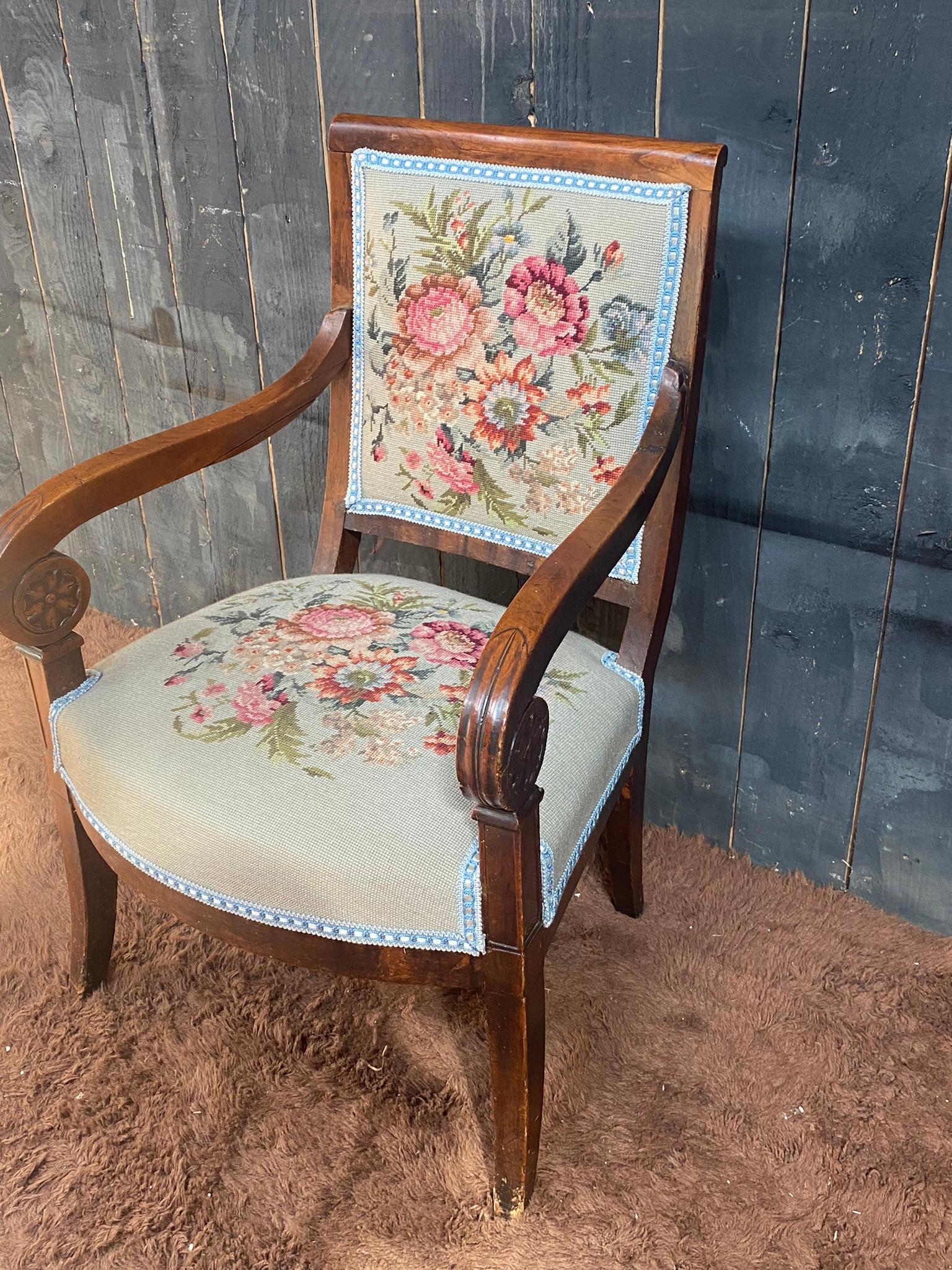 French Empire period armchair in walnut, upholstery redone For Sale
