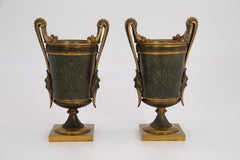 Empire period bronze and ormolu Grecian style pair of classical urns, circa 1830
