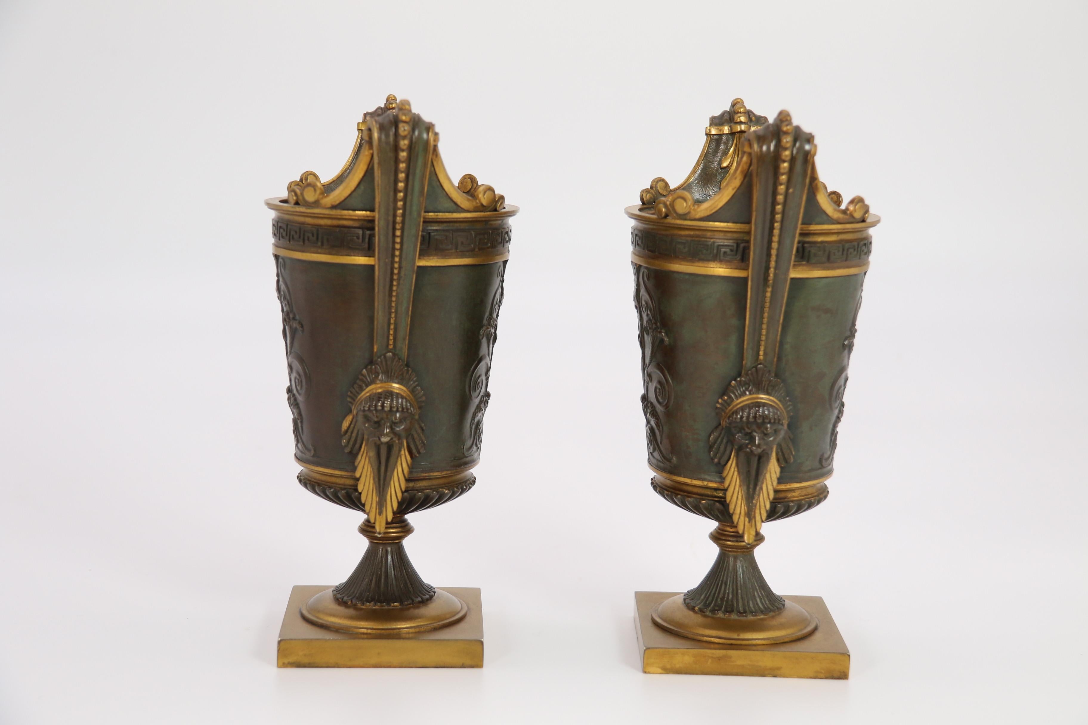 Empire period bronze and ormolu Grecian style pair of classical urns, circa 1830 In Good Condition For Sale In Central England, GB