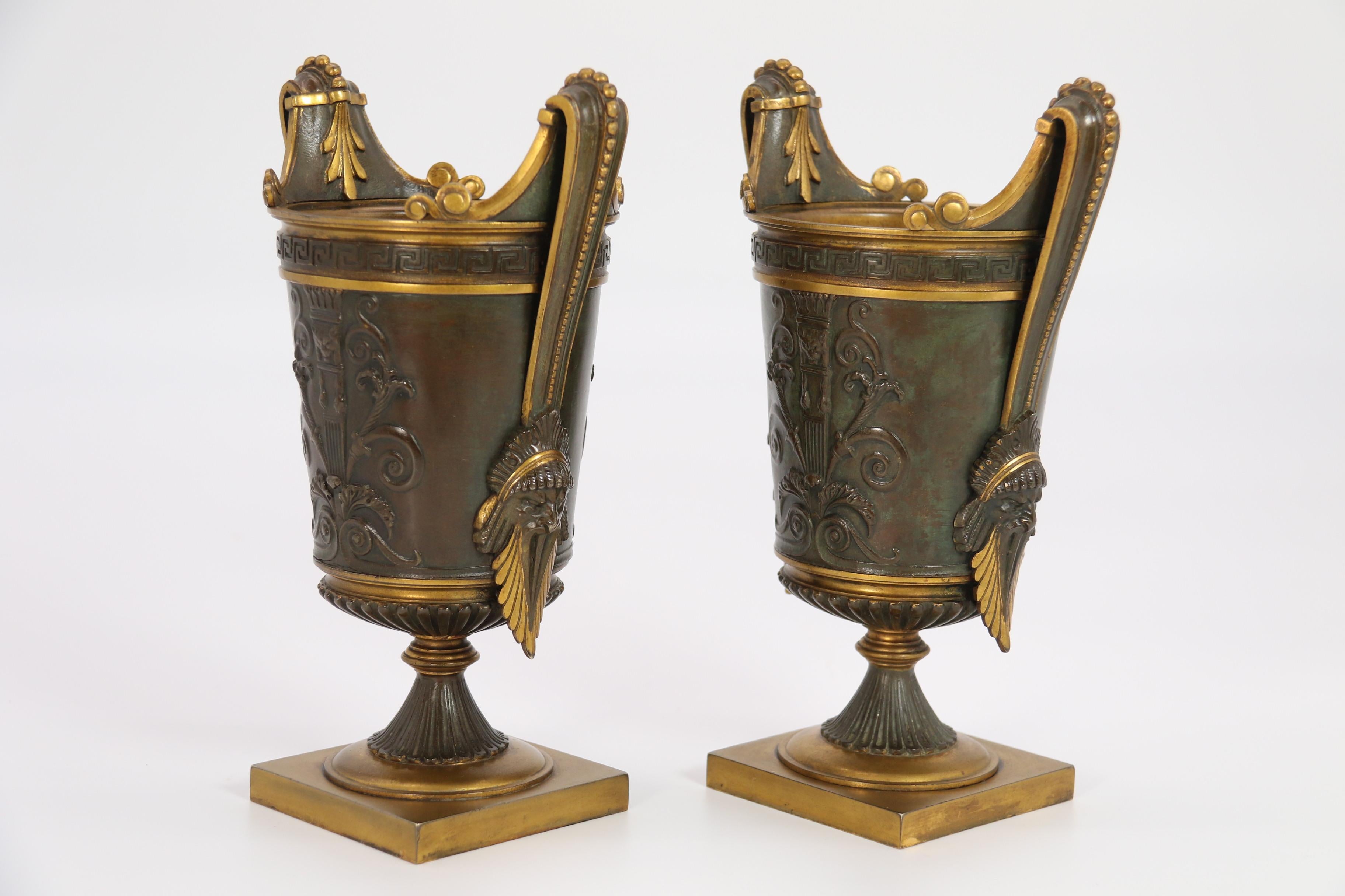 19th Century Empire period bronze and ormolu Grecian style pair of classical urns, circa 1830 For Sale