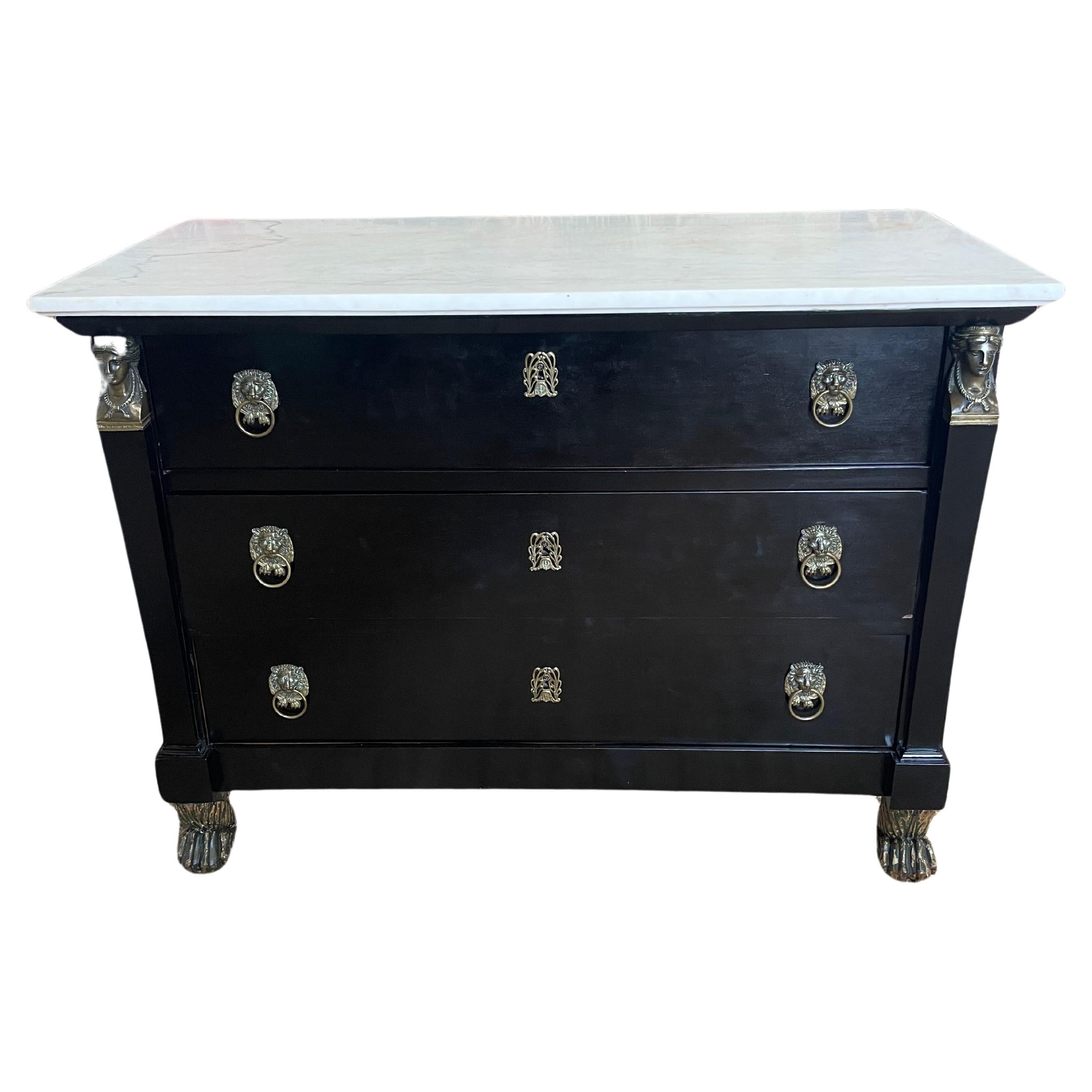 Empire period ebonised commode