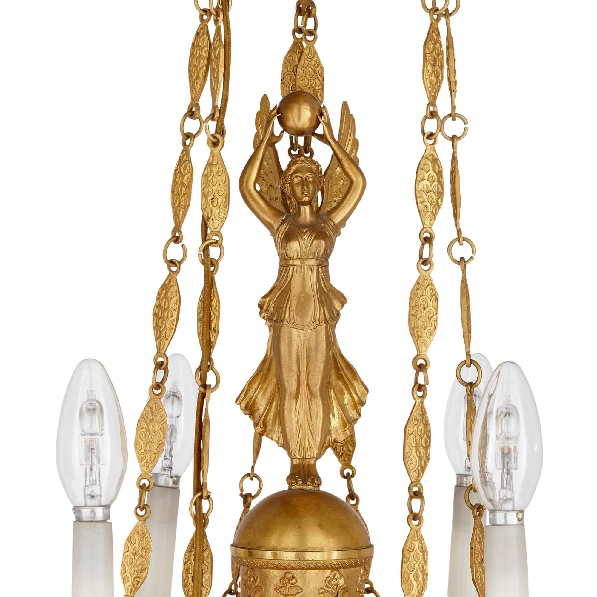 Empire period French gilt bronze six light chandelier
French, c. 1810
Height 80cm, diameter 45cm

Made in France around 1810, at the time when the Empire style was in vogue, the chandelier’s design encapsulates many of the features characterising