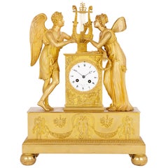 Empire period gilt bronze clock with Cupid and Psyche by Le Roy et fils