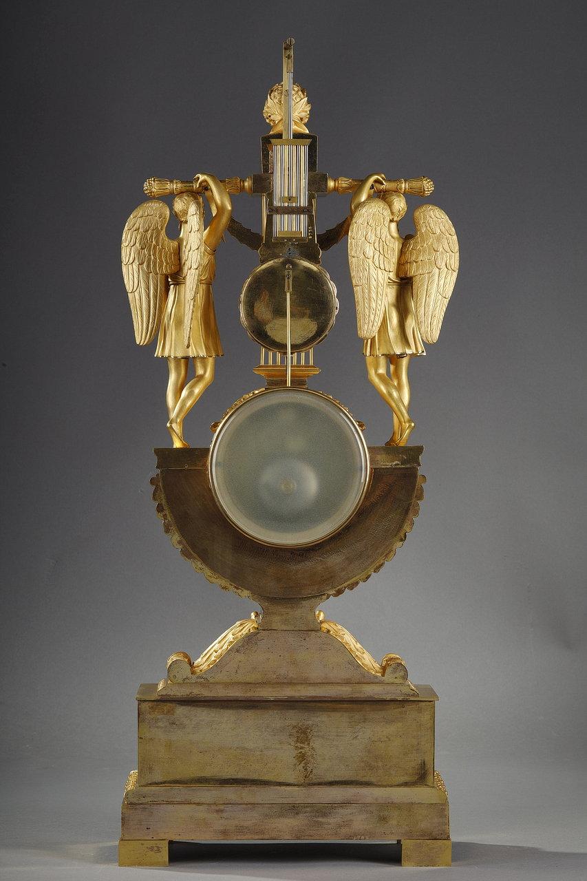 Horloge en forme de lyre en bronze doré d'époque Empire avec un buste de propriétaire en vente 11