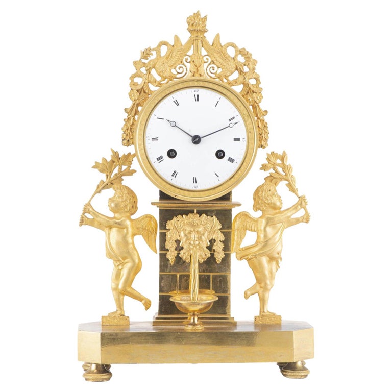 Empire Period Guides Bronze Mantel Clock, France, before 1840 For Sale