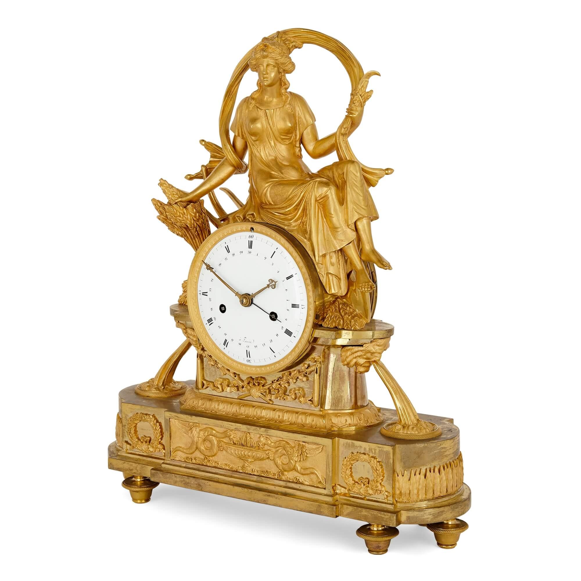 Empire period ormolu and enamel Ceres mantel clock after Thomire.
French, c.1810
Measures: height 46cm, width 38cm, depth 13cm.

This superb mantel clock was made in the First French Empire period after a model by the acclaimed bronzier and