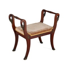 Empire period ormolu and mahogany swans' heads stool