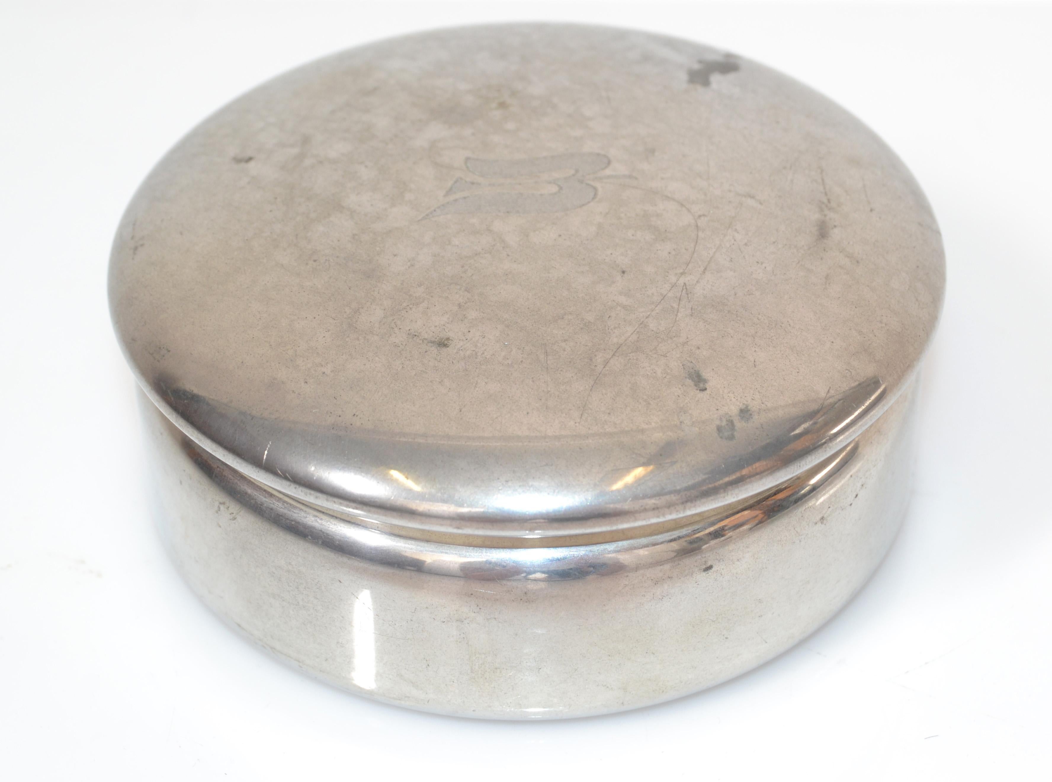 Scandinavian Modern silver color Jewelry decorative covered box, Trinket, Keepsake by Empire Pewter 701.
Inside is laid out with royal blue velvet and suits perfectly for Rings to keep.
This lidded box was made for the Royal Viking Sky Skald