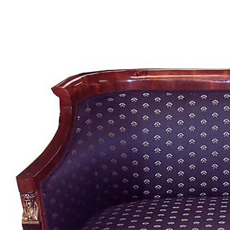 Empire Revival Loveseat in walnut, rootwood and ebonized wood with gilt bronze fittings. Navy upholstery with silver floral pattern.