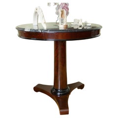 Empire round table with black marble