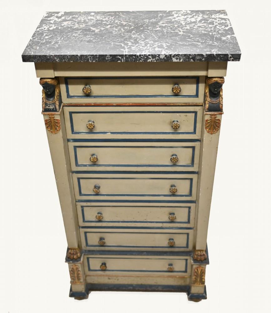 You are viewing a gorgeous French Empire semainier - or tall boy
Semainier refers to the fact that there are seven drawers - one for each day of the week - semaine
Very on trend with the painted designs including acanathus leaves and pharao