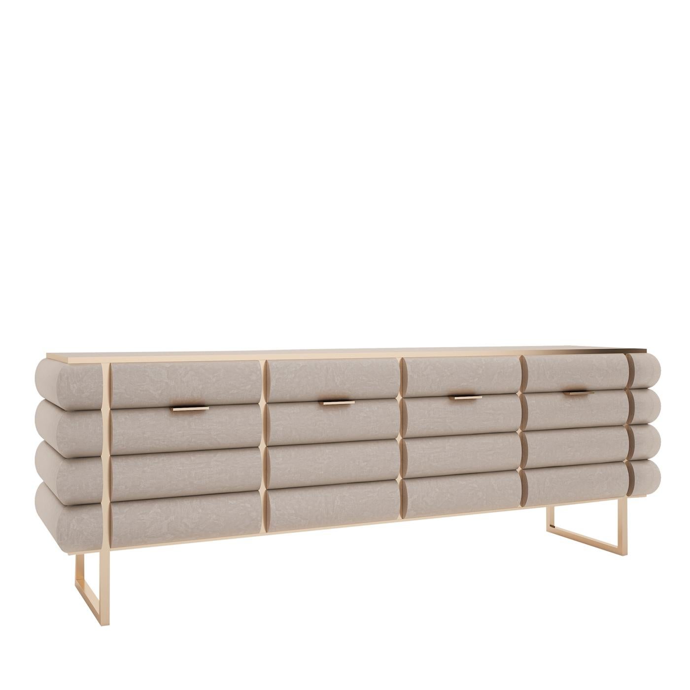 The lavish yet sophisticated flair characterizing this sideboard makes it perfect to be a versatile furniture piece. Sitting atop a brass-finished, light metal base, its wooden silhouette comprises four wide compartments and its surface is enlivened