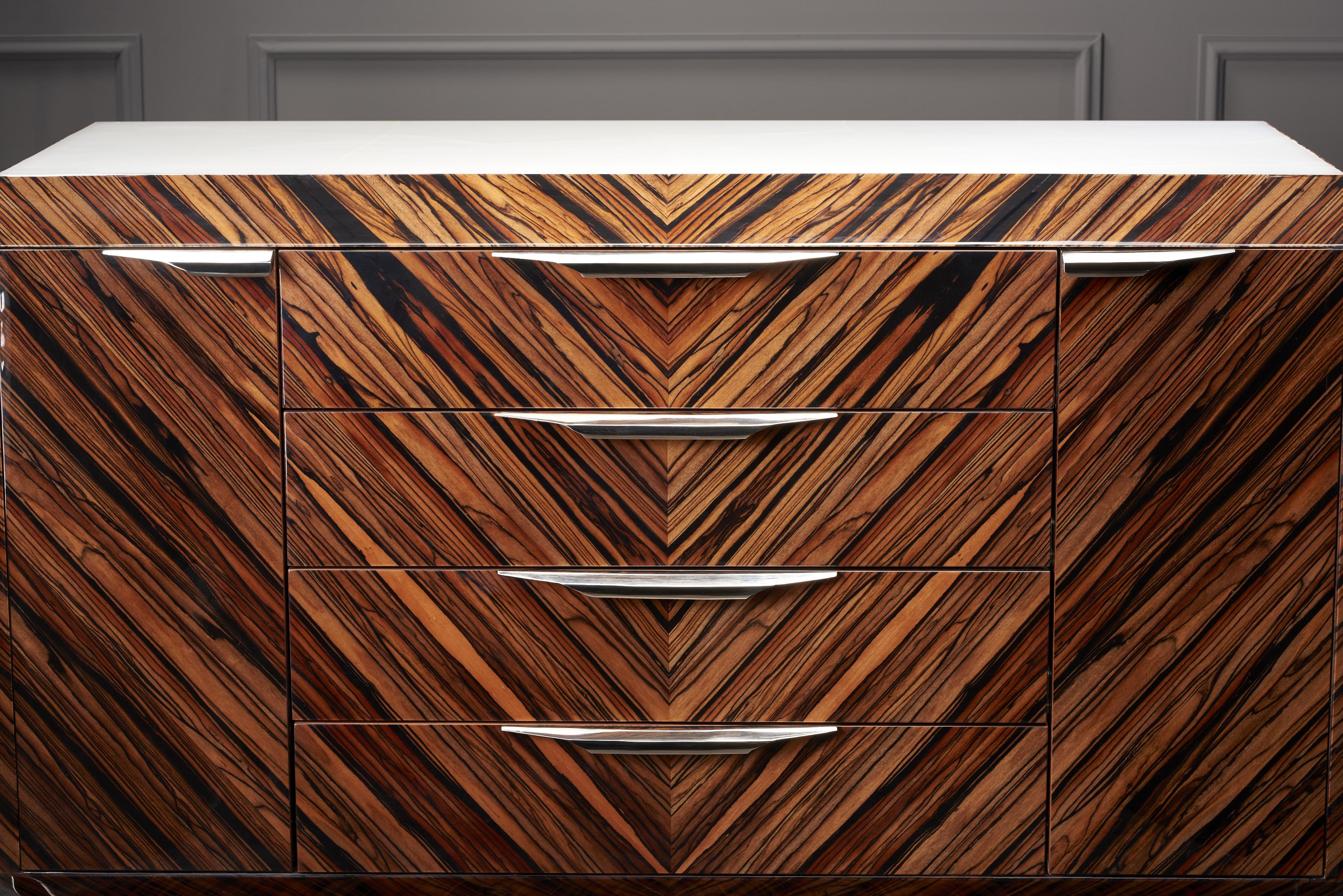 Empire small

This size of the Empire is as majestic as the large one. The Empire chest of drawers guarantees timeless beauty and exclusive quality. Its main features are the bold, geometric design and the simplified outline. It suggests firmness