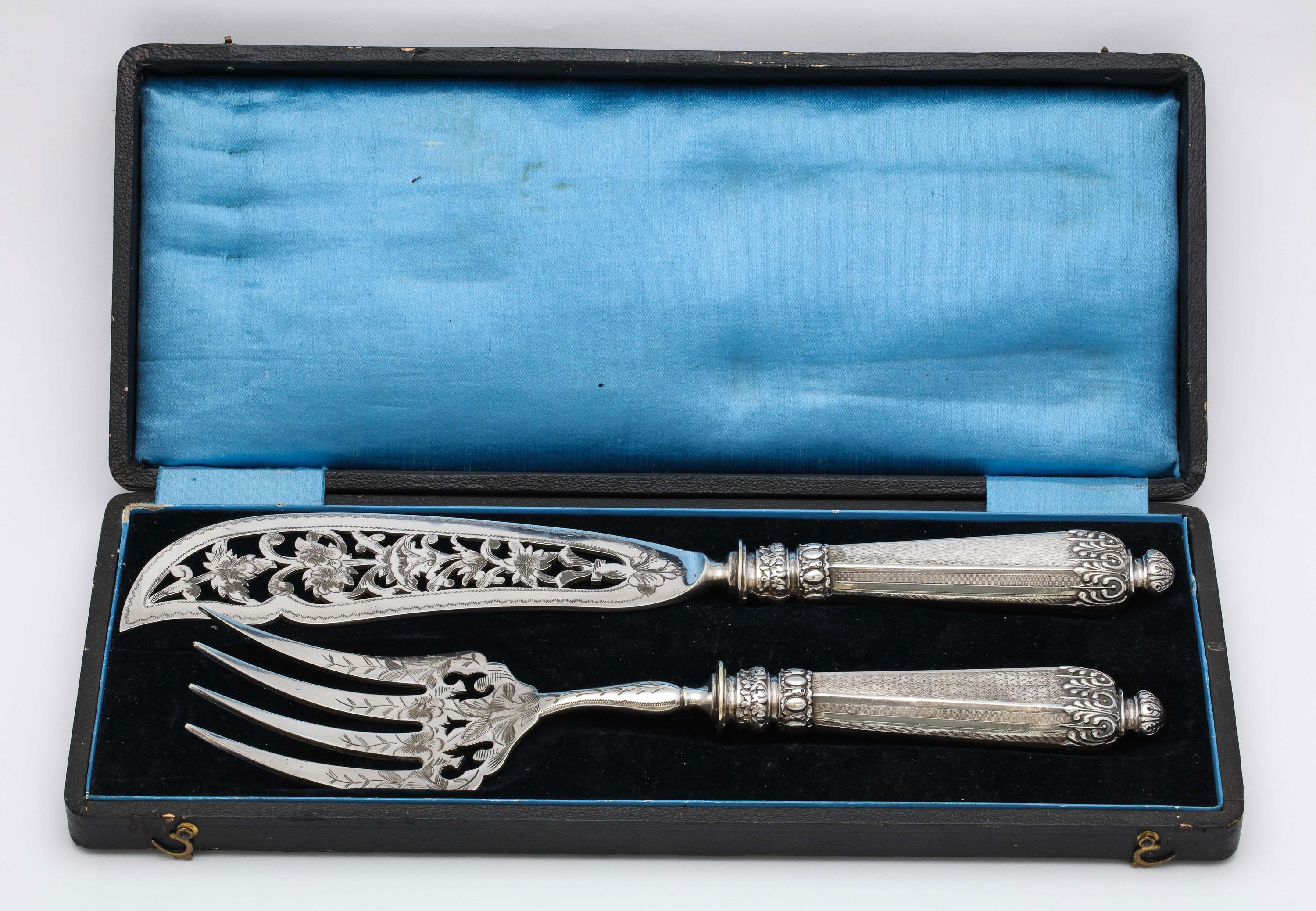 Empire, French, sterling silver-mounted, two-piece fish serving set in original box, Paris, circa 1875. Monogrammed with a script letter B. Original box (which comes with the set) has the same gilt letter B monogram on its lid. Fish serving knife