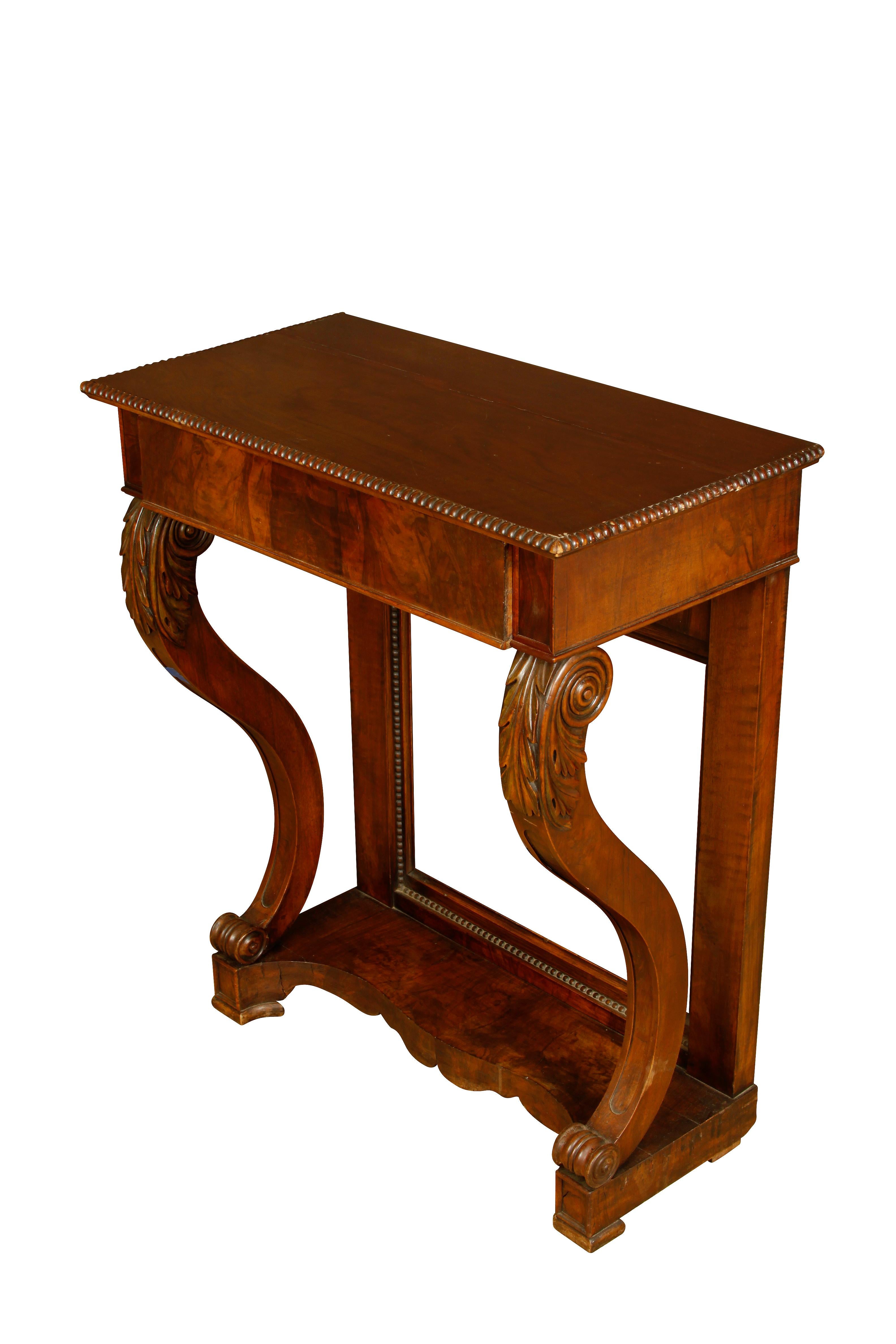 Empire style American mahogany console with carved edge top with single drawer and acanthus carved details to cabriole legs.