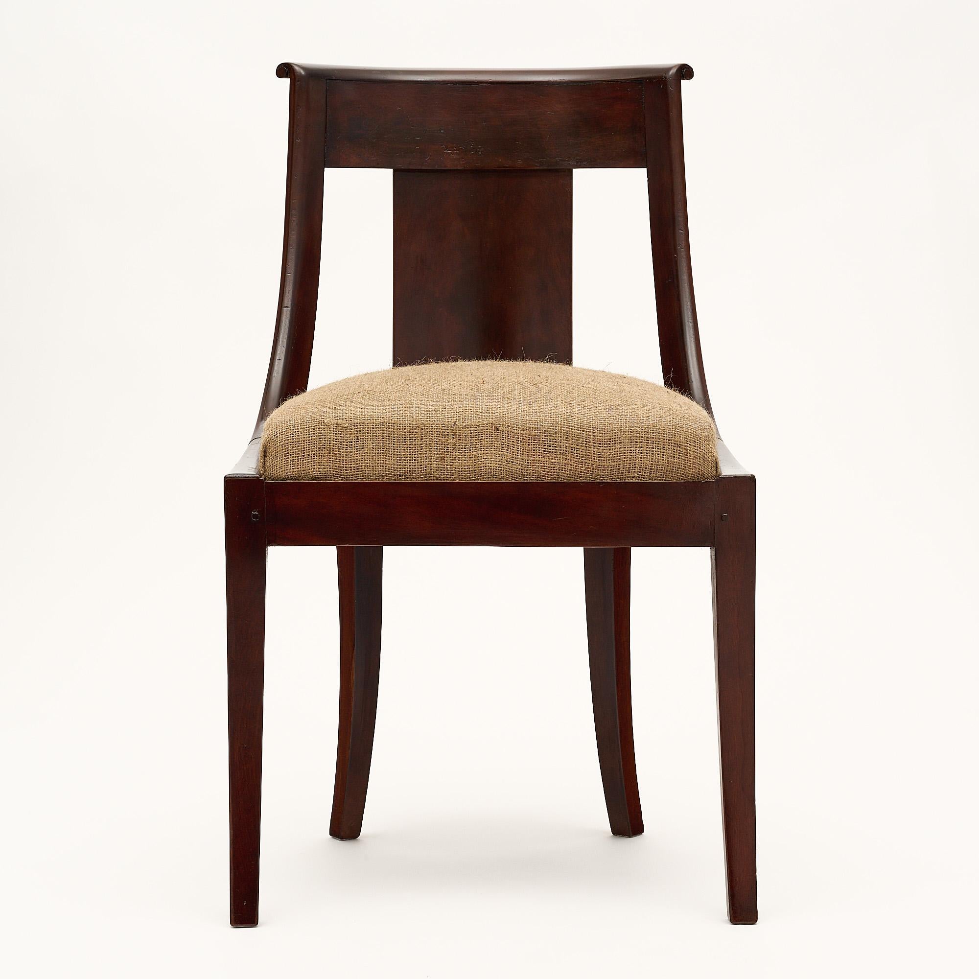 Set of six chairs, French, in the Empire style. This set is made of solid flamed Cuban mahogany. They have a newly done natural burlap upholstery.