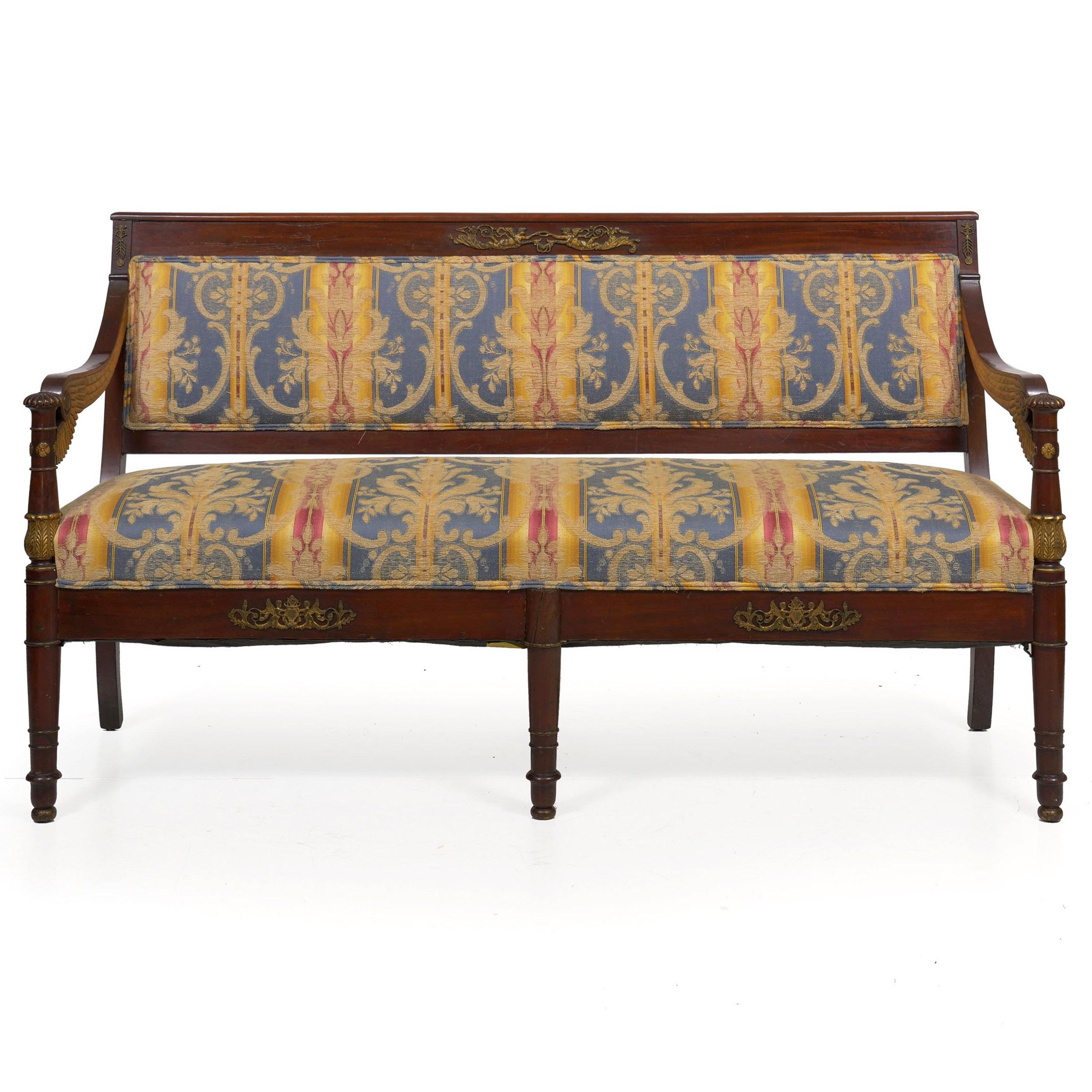 Empire style parcel-gilt and mahogany sofa
Continental, circa early 20th century, with carved wing supports
Item # 009RKR18 

A most attractive Empire style settee from the first quarter of the 20th century, it has restrained dimensions that