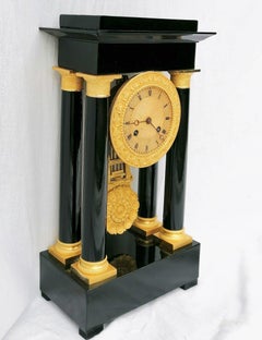 Empire Style Black and Golden Bronze Table Clock, France, 19th Century