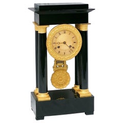 Empire Style Black and Golden Bronze Table Clock, France, 19th Century