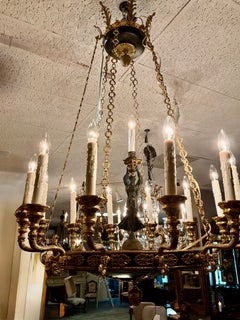 Empire style black enamel and gilt brass chandelier