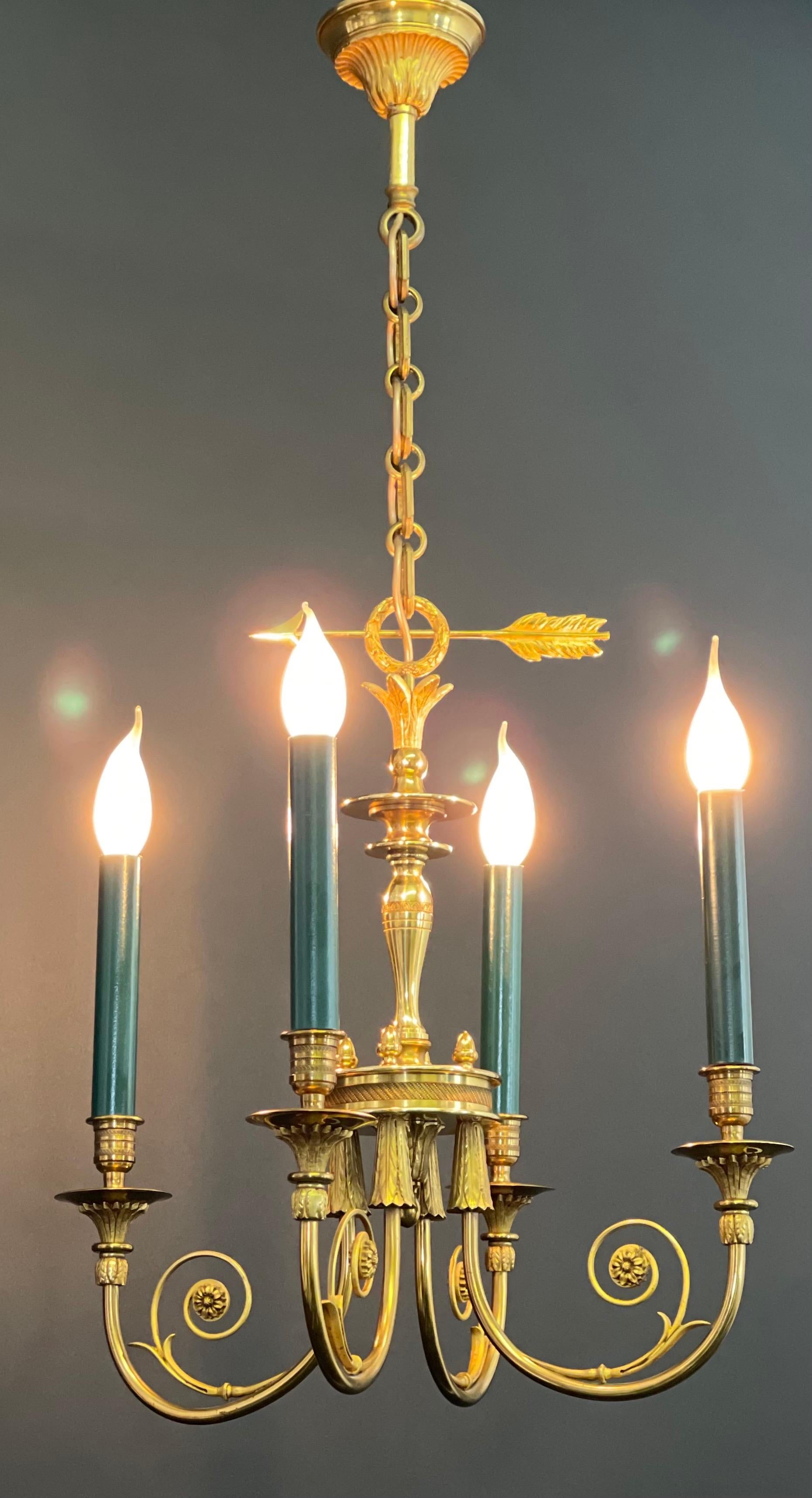 A beautiful solid bronze chandelier Paris, France, circa 1980s.
This chandelier is inspired by the mid-18th century and in the style of Louis XVI.
Measures: Height without chain is 28.34 inch, with chain. 59.00 inch.
Socket: 4 x E14 for standard