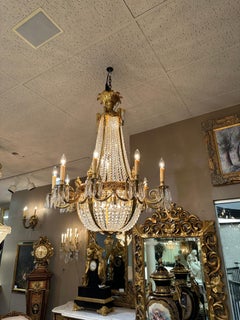 Empire style bronze dore chandelier with crystal