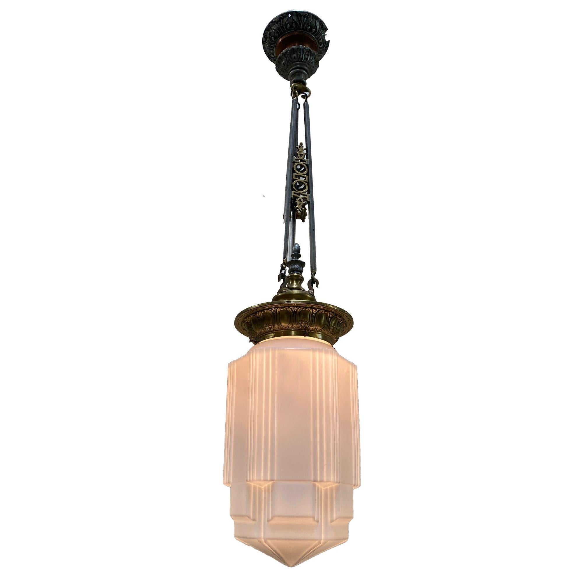Set of 4 rare Empire Deco style ceiling pendants with stepped milk glass geometric school house style glass globe with a geometric Art Deco design.
