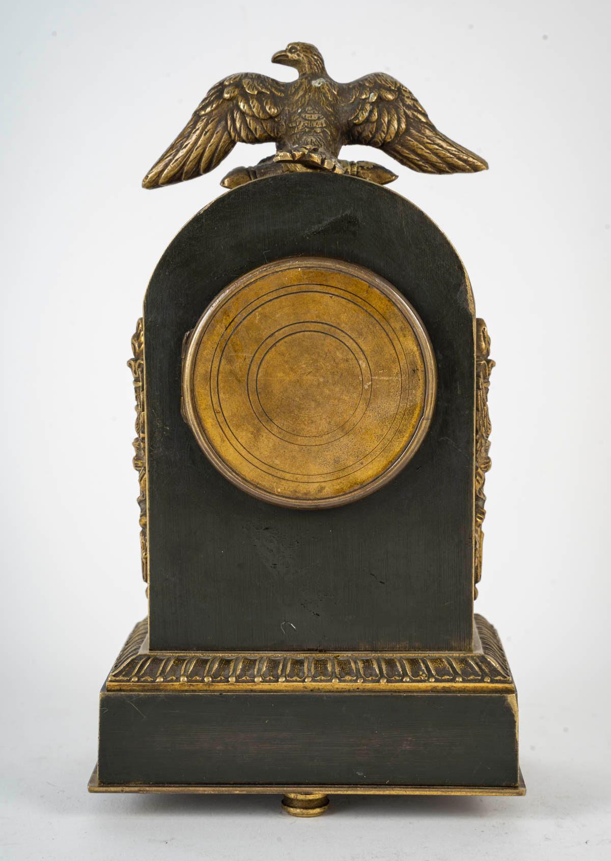 Empire Style Bronze Travel Clock, late 19th Century or Early 20th Century. In Good Condition For Sale In Saint-Ouen, FR