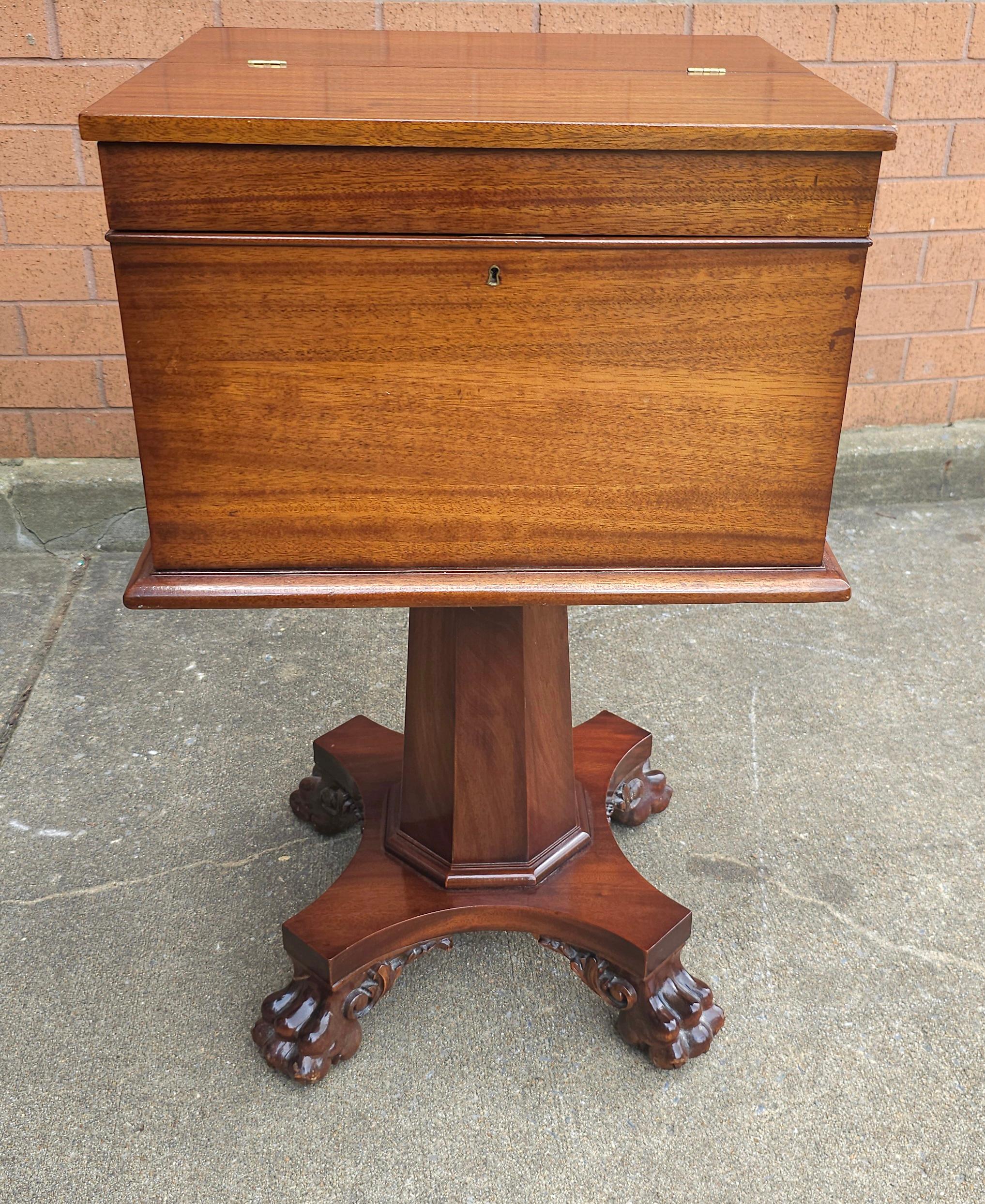 A mid-Century  American Empire Style Carved Mahogany Hinged Box On Stand / Sewing Table in great vintage condition. Recently refinished. Measures 19