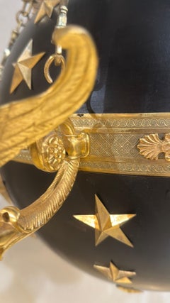 Empire style chandelier. With swans heads