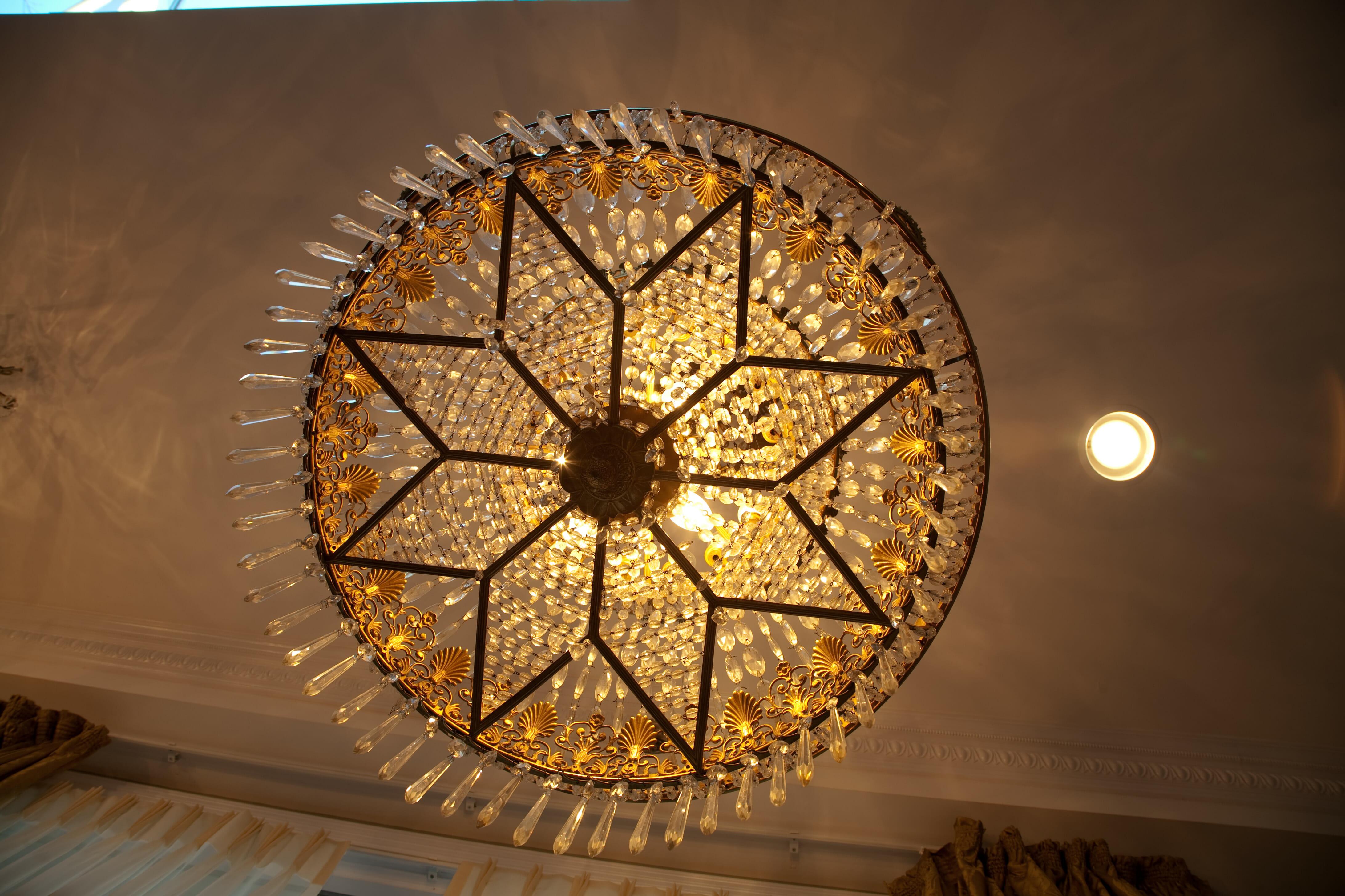 French Empire Style Crystal and Bronze Star Chandelier For Sale