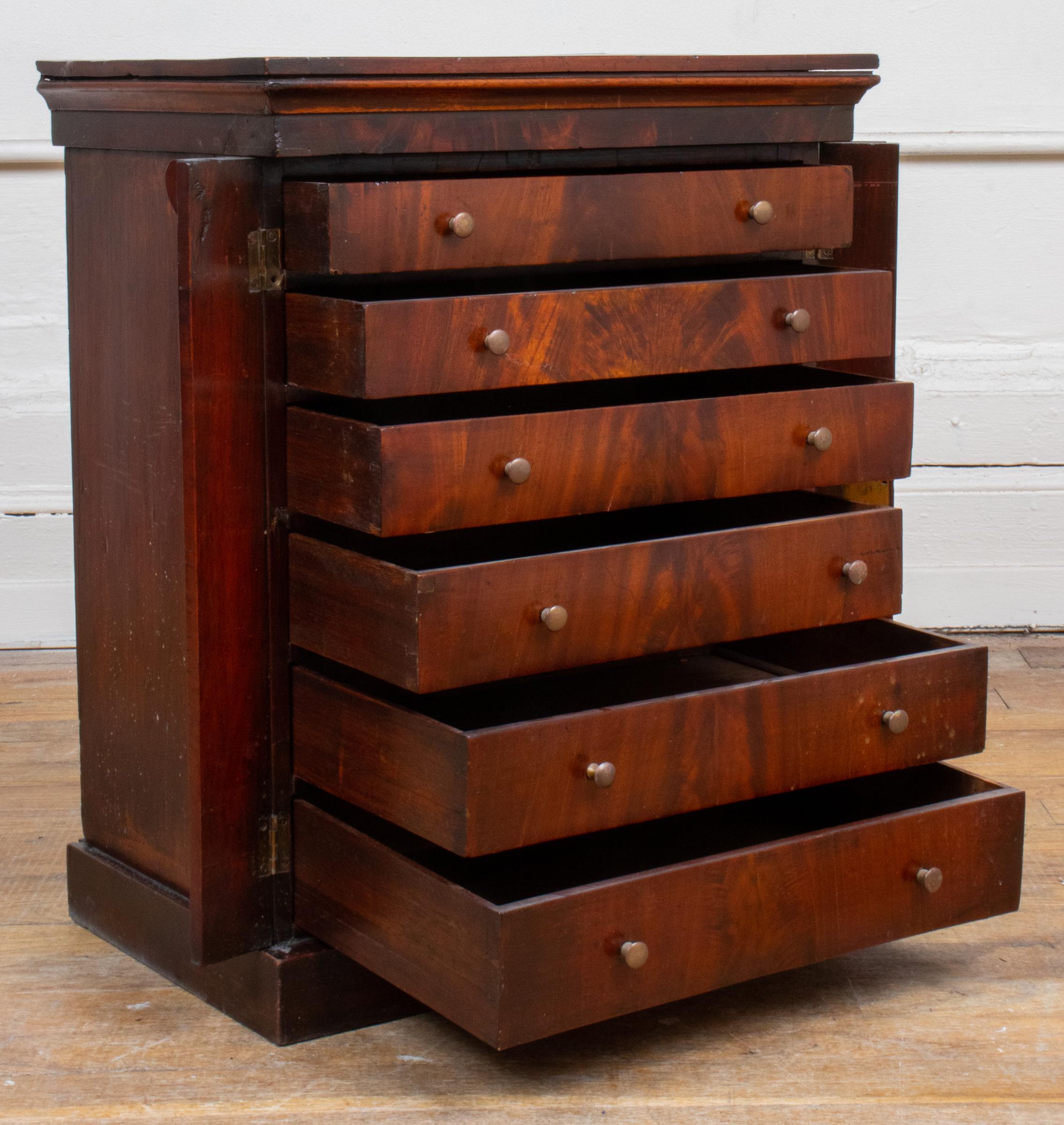 European Empire Style Diminutive Flame Mahogany Chest of Drawers