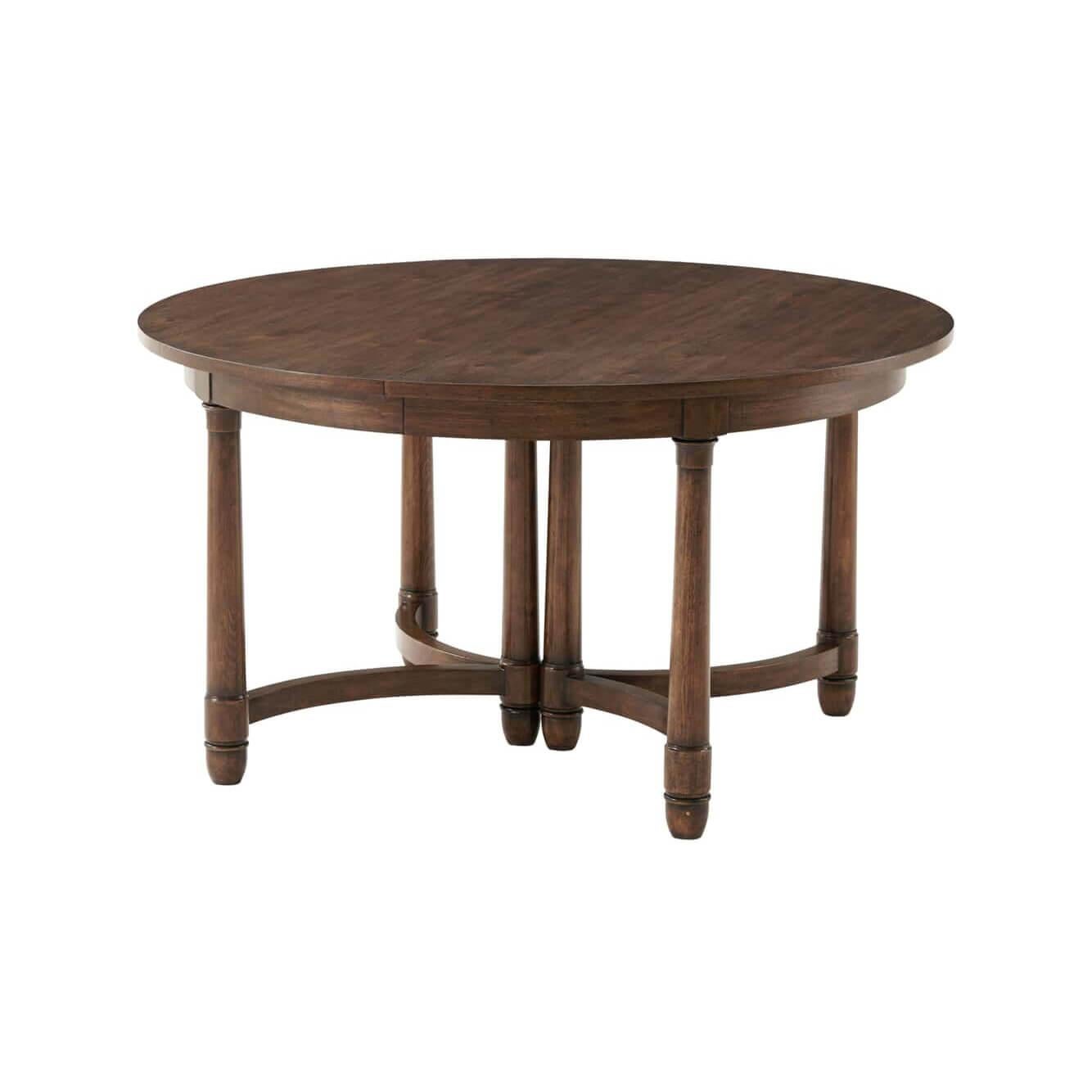 Empire style beech and knotty walnut extending dining table with a circular top extending with two additional leaves, a plain frieze on turned legs with acorn feet with triple end legs and joined by concave stretchers.
Dimensions: 94