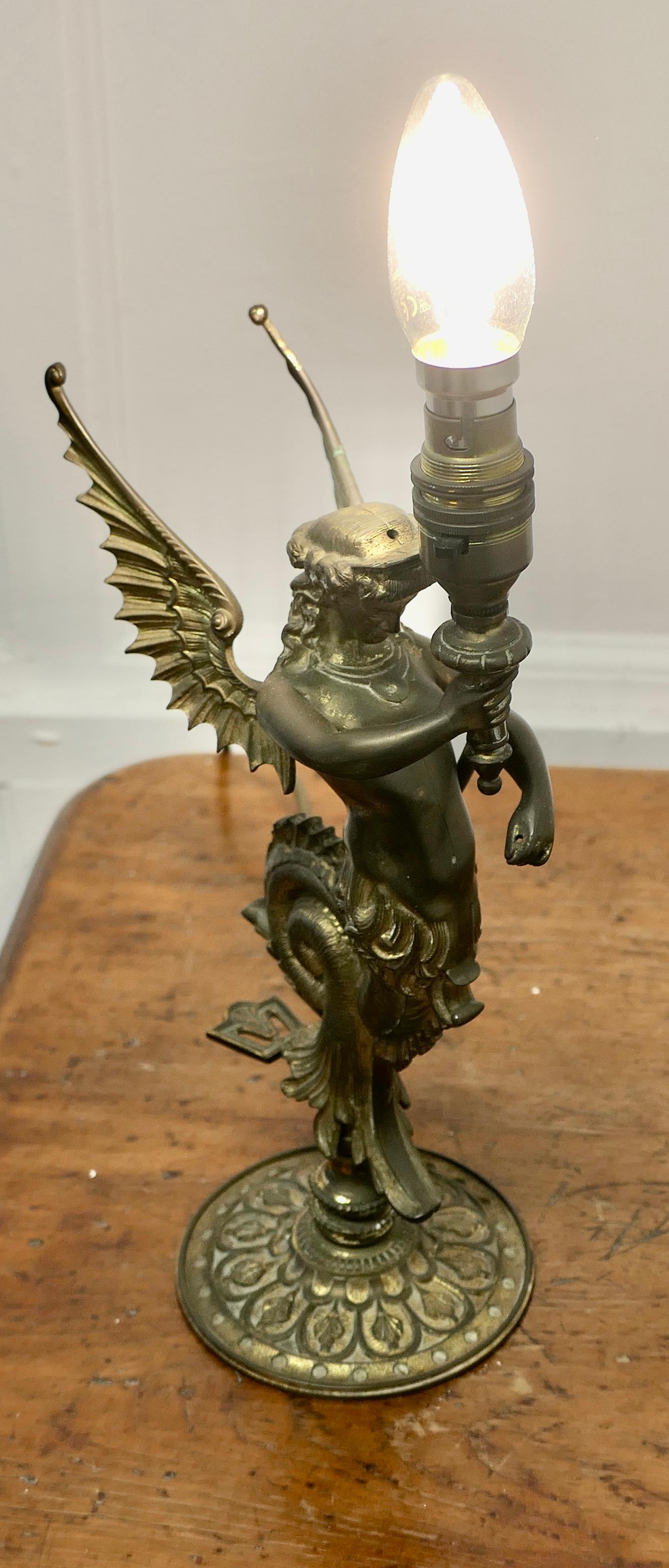 Empire Style Figural Siren Bronze Lamp  

A Charming bronze lamp, the lamp has been converted from a gas light has a statue of a Siren set on the back plate of the wall fitting
The lamp is fully working, and the wiring is new
The lamp is 14” tall