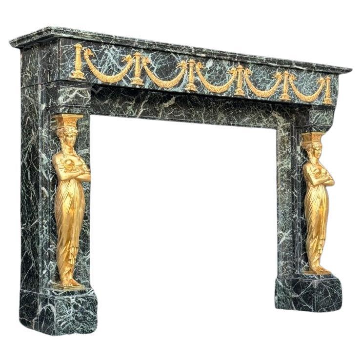 Empire Style Fireplace In Antique Green Marble And Gilded Bronze For Sale