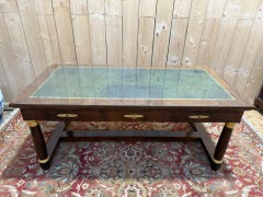 Empire style flat desk in mahogany and green leather