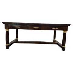 Empire style flat desk in mahogany and green leather