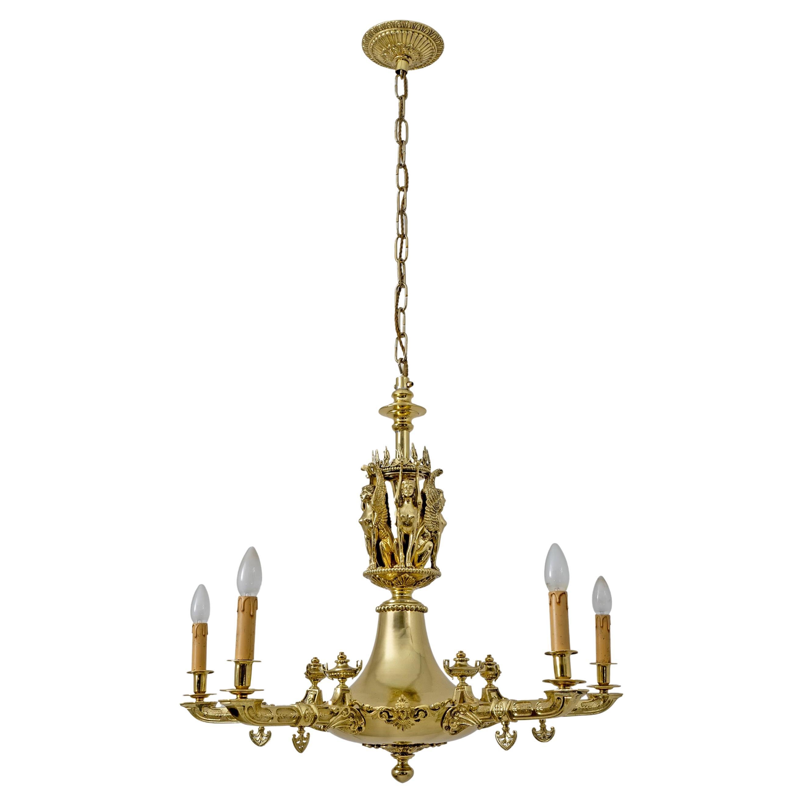 Araña de bronce dorado estilo Imperio con figuras aladas - Italia, Principios del S. XIX