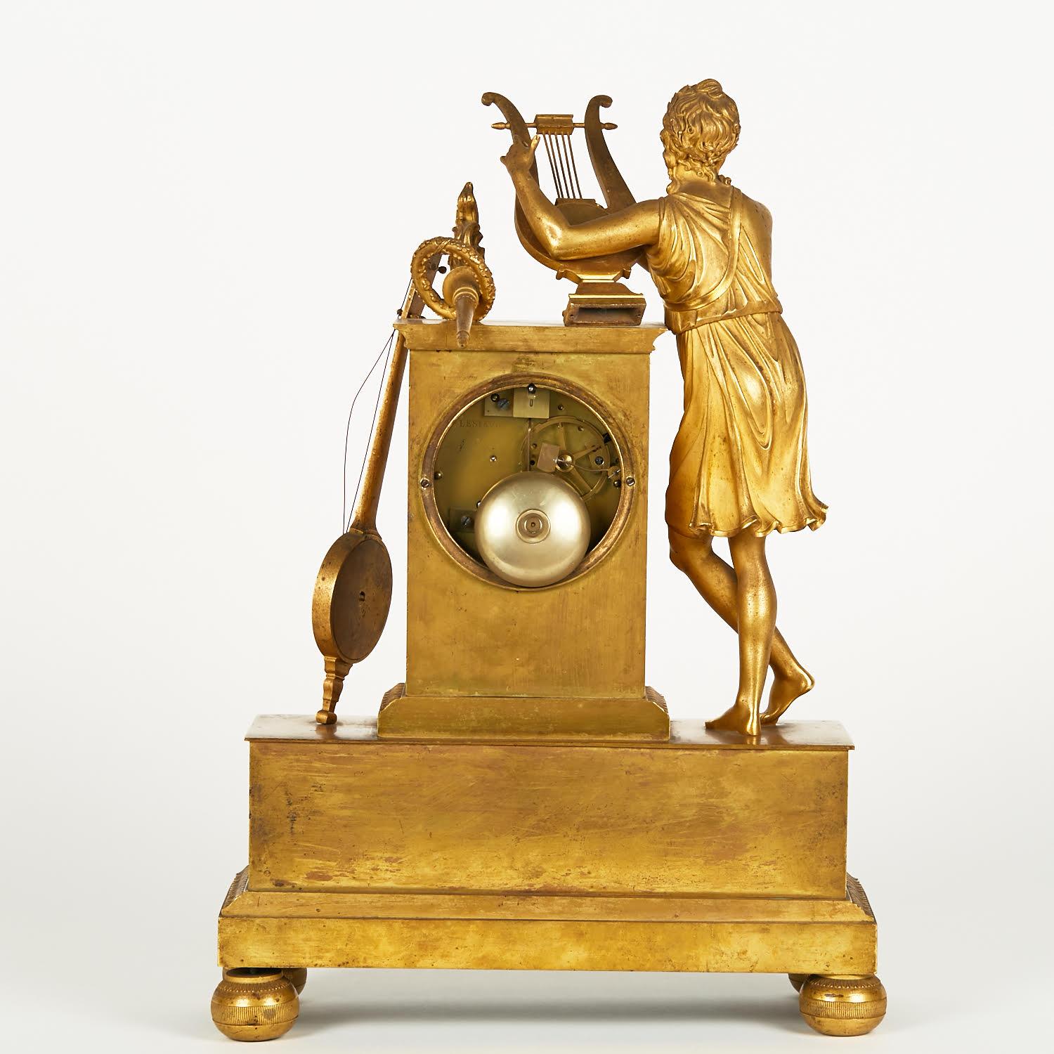 French Empire Style Gilt Bronze Clock from the 19th Century. For Sale