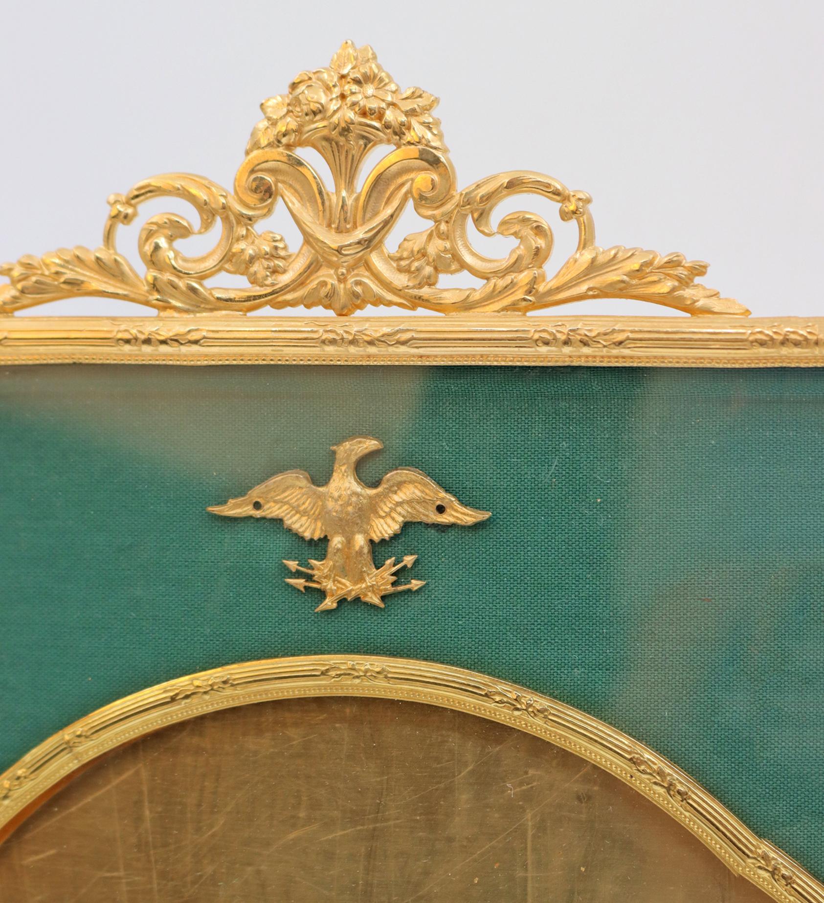 An important Empire style square gilt bronze and green fabric frame, Napoleon III period, 19th century.